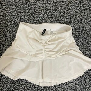 White mini tennis skirt